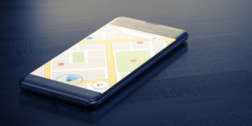Mobile phone displaying map with geo-tracking.