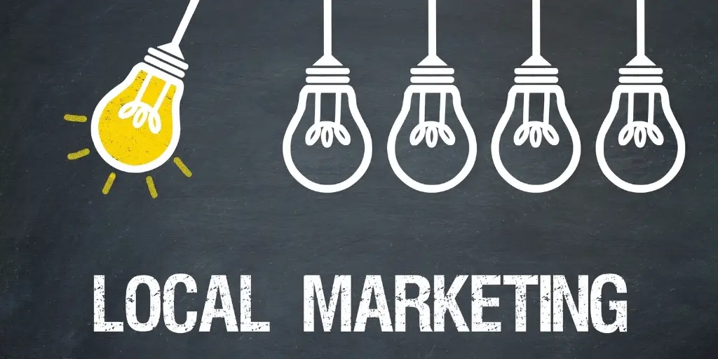 Drawing of lightbulbs hanging over text that reads local marketing.
