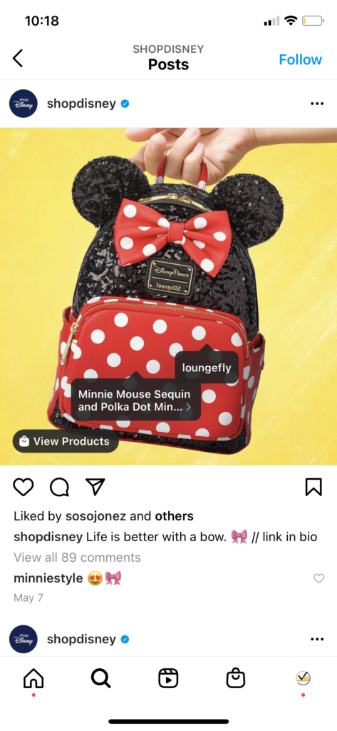 Shoppable post from shopDisney on Instagram featuring a Minnie Mouse bag. 