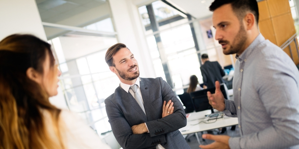 Businessman training his brand ambassadors how to practice listening to customers.