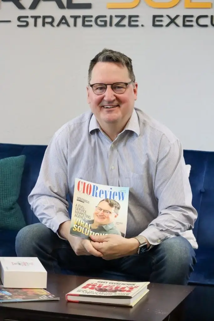 Co-founder and Co-Owner, Thomas Von Ahn, holding magazine his face and his company is featured on.